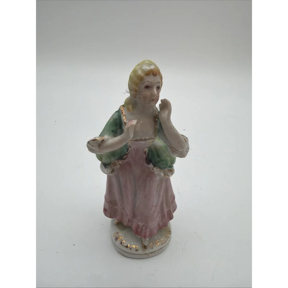 vintage hand-painted porcelain colonial or Victorian lady figurine